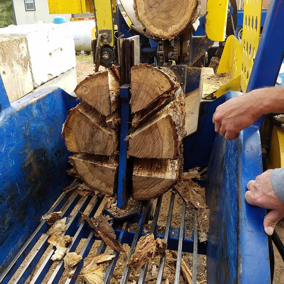 Person using wood cutting machine
